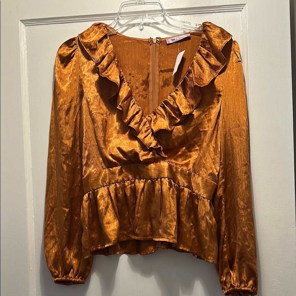 Elegant Ruffled Gold Top